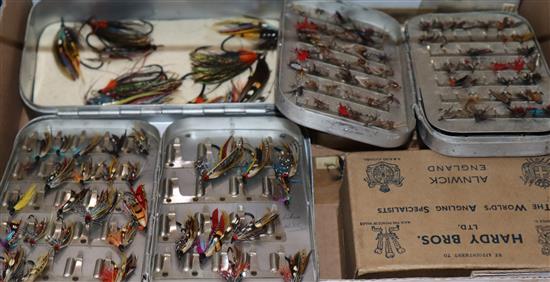 A collection of vintage Hardys fishing flies in Hardy tins and loose